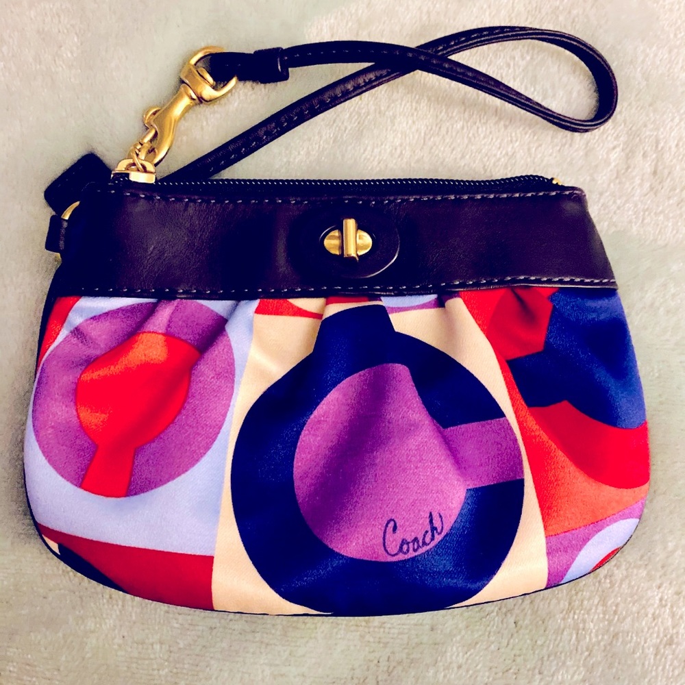 Coach Navy Leather and Silk Ivory Design Wristlet.